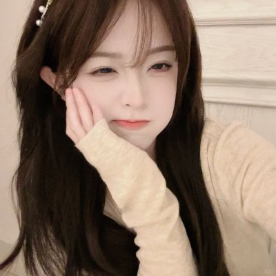 桃花含露又春风